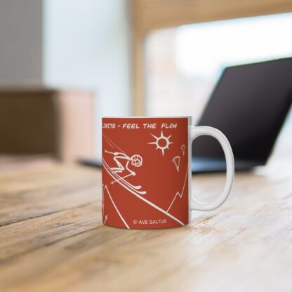 cool orange skiers teacup on a office desk