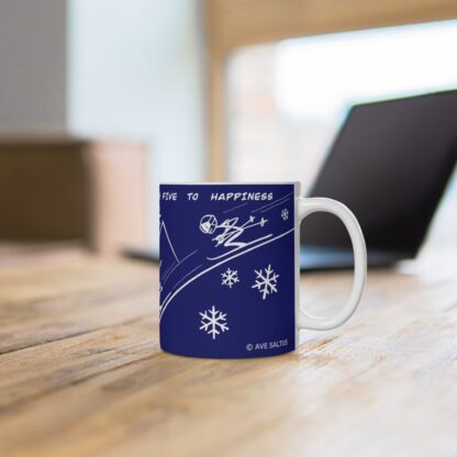 blue ceramic mug with skiers print