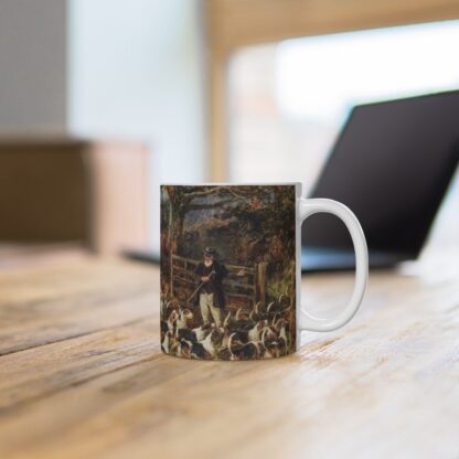 a manor mug picturing an old man opening the gate for huntsmen and houns