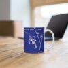 Blue ceramic mug with female skiers sublimation print. She Skis like a Boss, the Skiing Girls Coffee Cup