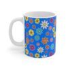 Blue eyed Mary a sky blue porcelain cup with floral print, handle left.