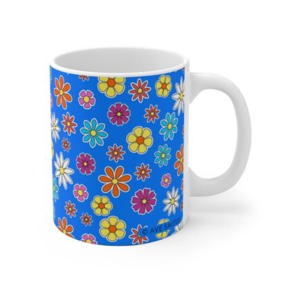 Blue Eyed Mary a sky blue Ceramic Cup with floral print handle right.