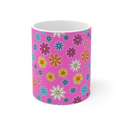 Campion a pink porcelain cup with floral print, front view.