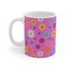 Campion a pink porcelain cup with floral print, handle left.