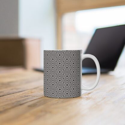 Cosmic Contours mug on desk