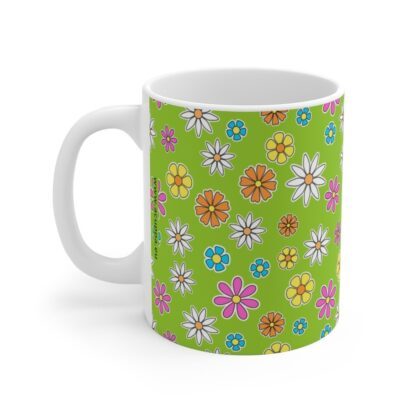 Daisy lime green porcelain cup with floral print, handle left.