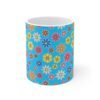 Forget Me Not blue porcelain cup with floral print, front view.