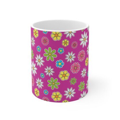 Fuchsia a raspberry red porcelain cup with floral print, front view.