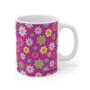 Fuchsia a raspberry red Ceramic Cup with floral print handle right.