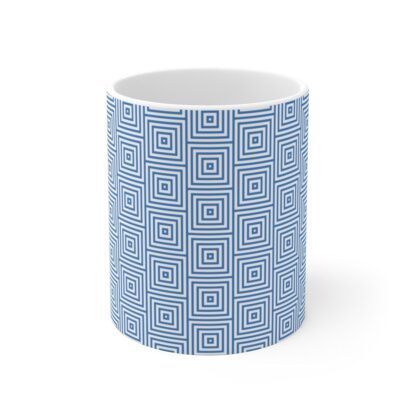 Symmetric serenity white ceramic cup with blue sublimation print.