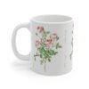 A chique powder pink rose Double Blush on a white porcelain cup - handle left