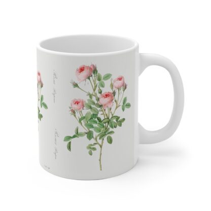 A chique powder pink rose Double Blush on a white porcelain cup - handle right