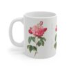 A decorative Rosa Damascena on a white porcelain cup handle left