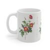 A stylish red Alpine Rose on a white porcelain cup - handle left