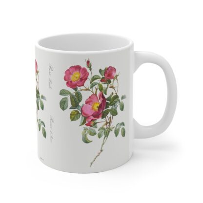 An appealing red Pimpinellifolia rose on a white porcelain cup - handle right